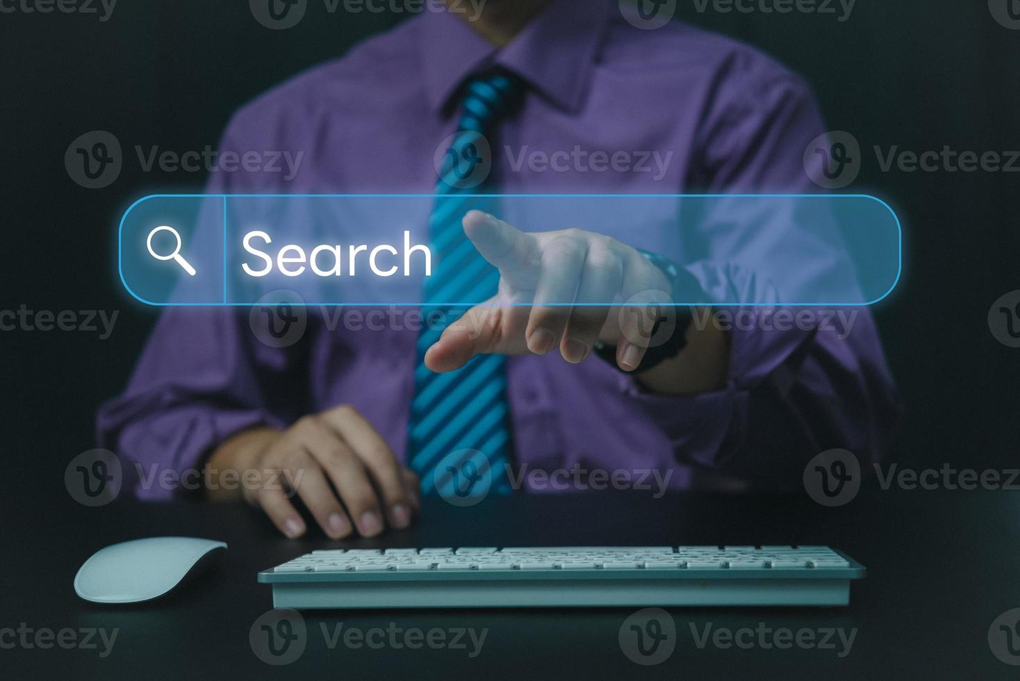 Man use computer to Searching for information.Search On Virtual Screen Data Search Technology Search Engine Optimization.Internet website online concept. photo