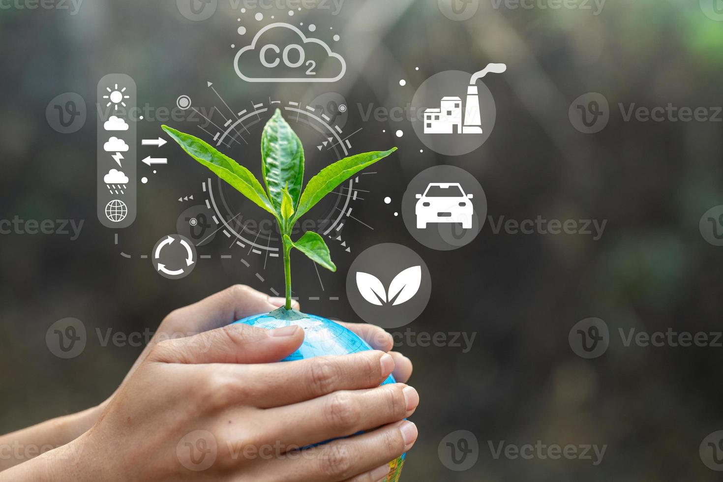 Trees that grow on the globe are in human hands with technology of renewable resources to reduce pollution ESG icon concept in hand for environmental, social and sustainable business governance. photo