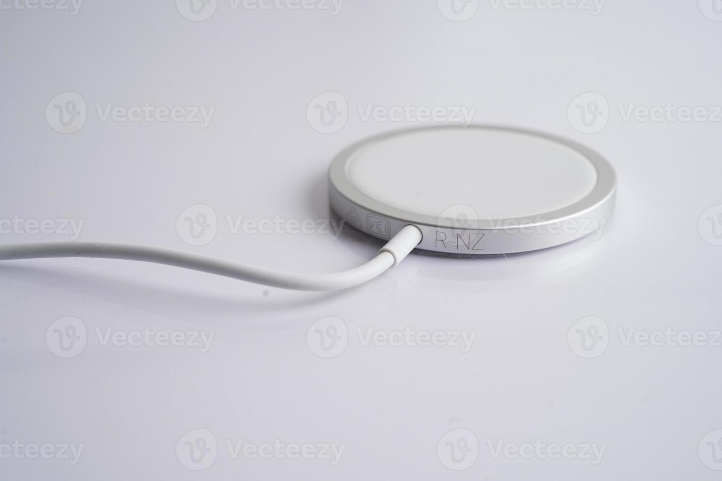 Wireless charger, magnetic charging modern equipment of mobile phone. photo