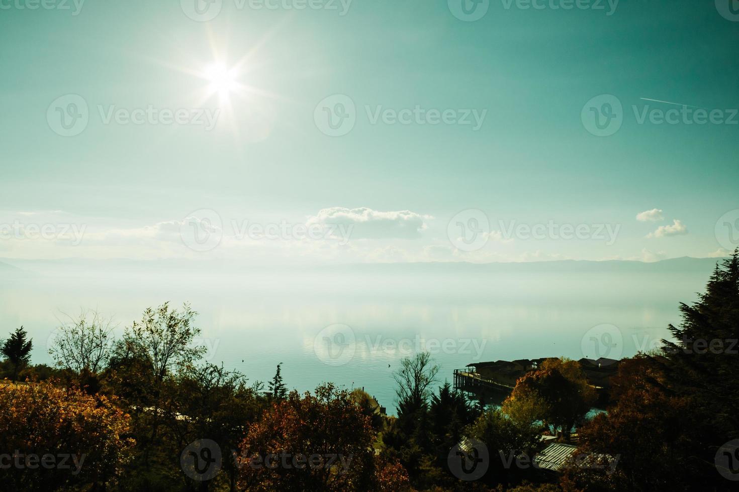 Sun over the horizon photo