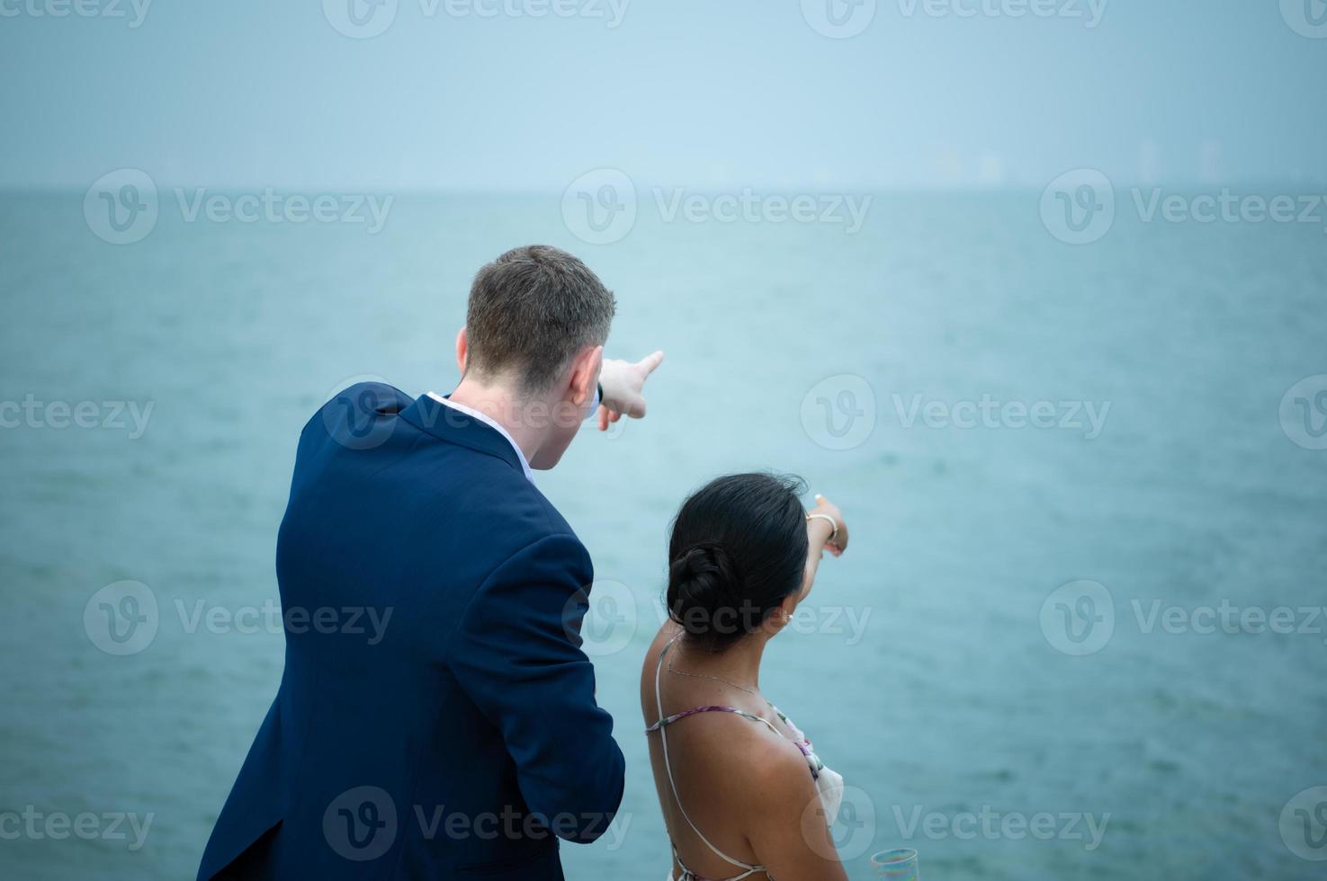 Happy moments of interracial couples on a yacht The couple had their honeymoon at one of Asia's photo