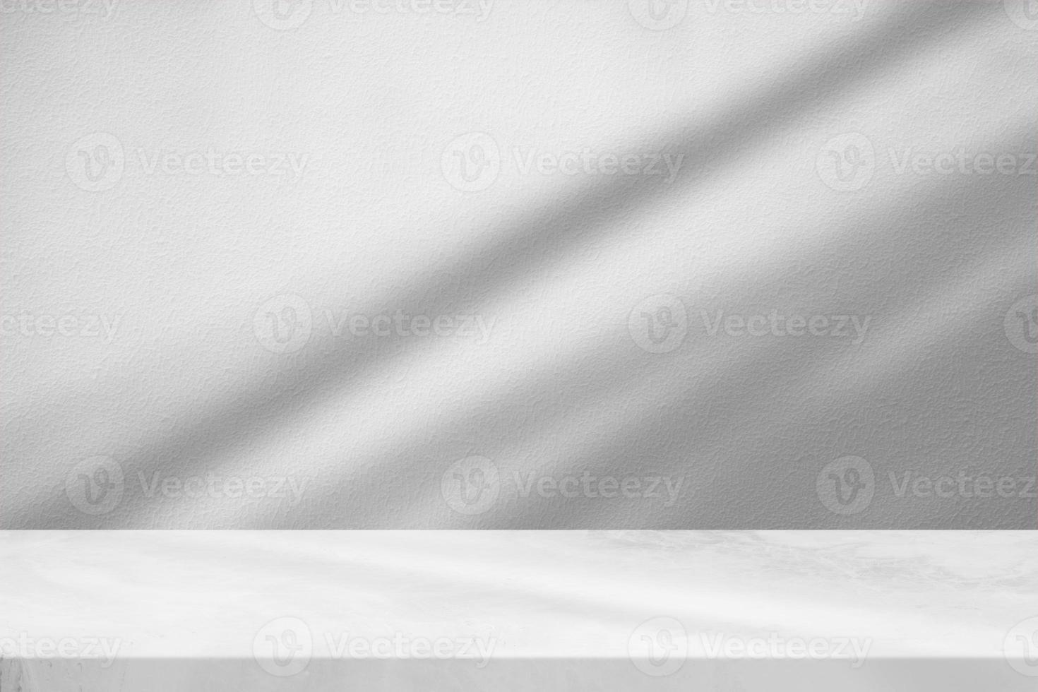 Marble Table with White Stucco Wall Texture Background with Light Beam and Shadow, Suitable for Product Presentation Backdrop, Display, and Mock up. photo
