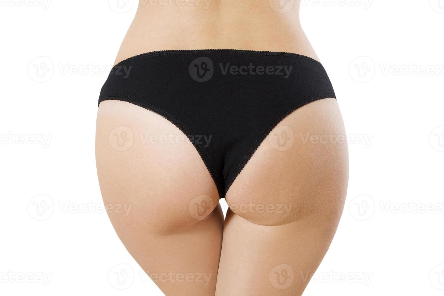 Close-up of woman in black blank template panties isolated. Women underwear with copy space and mockup. Booty building and anti cellulite treatment. Cropped image. Body health and bodyshape. photo