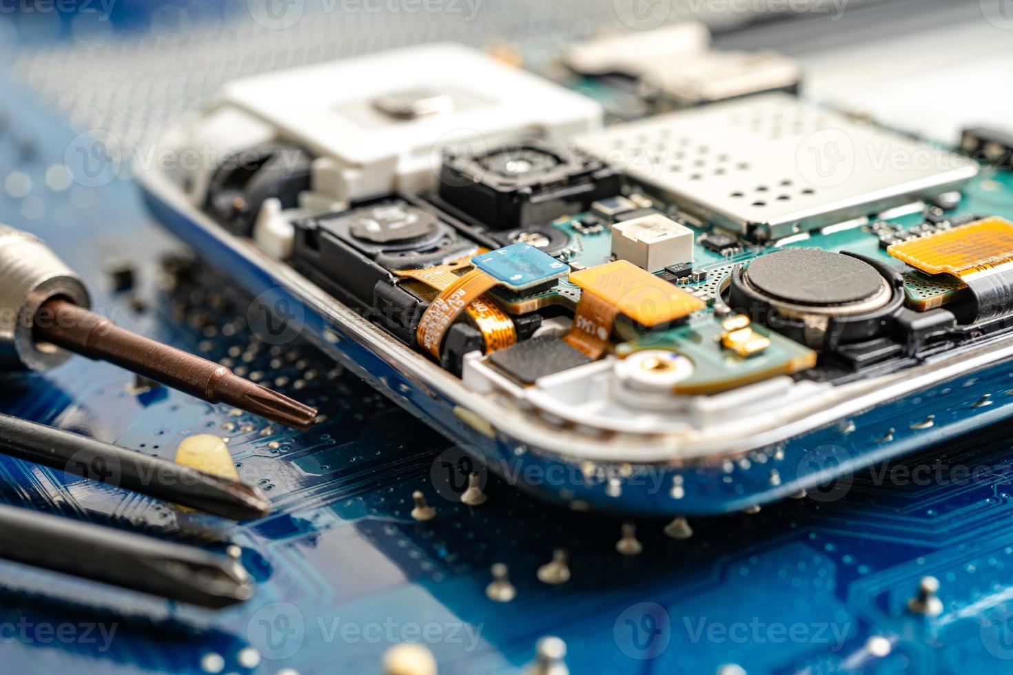 Repairing and upgrade mobile phone, electronic, computer hardware and technology concept. photo