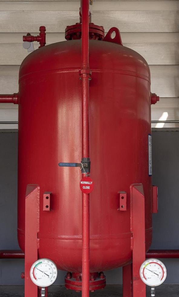 Red nitrogen tank for fire suppression system 14324788 Stock Photo at