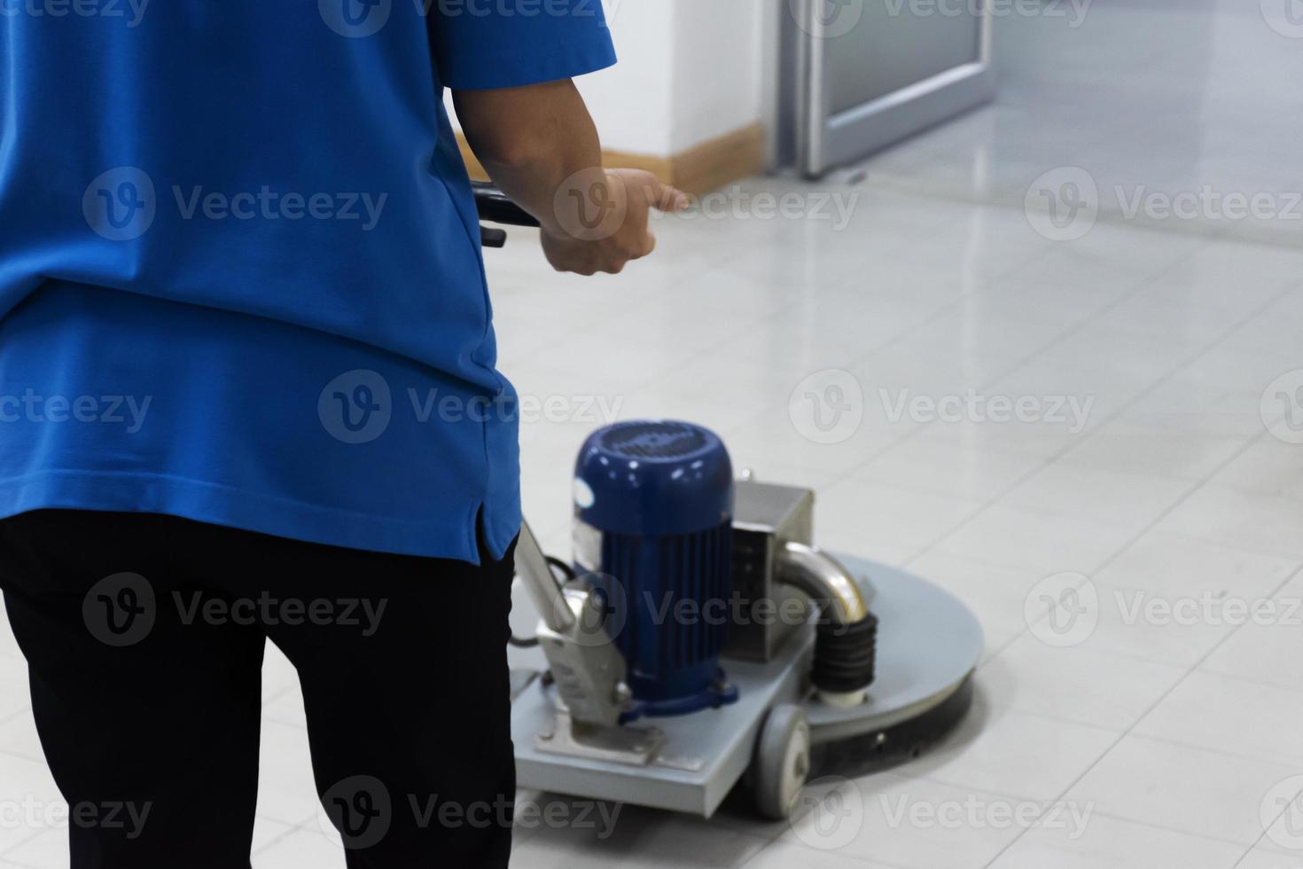 Cleaning lady with washing machine photo