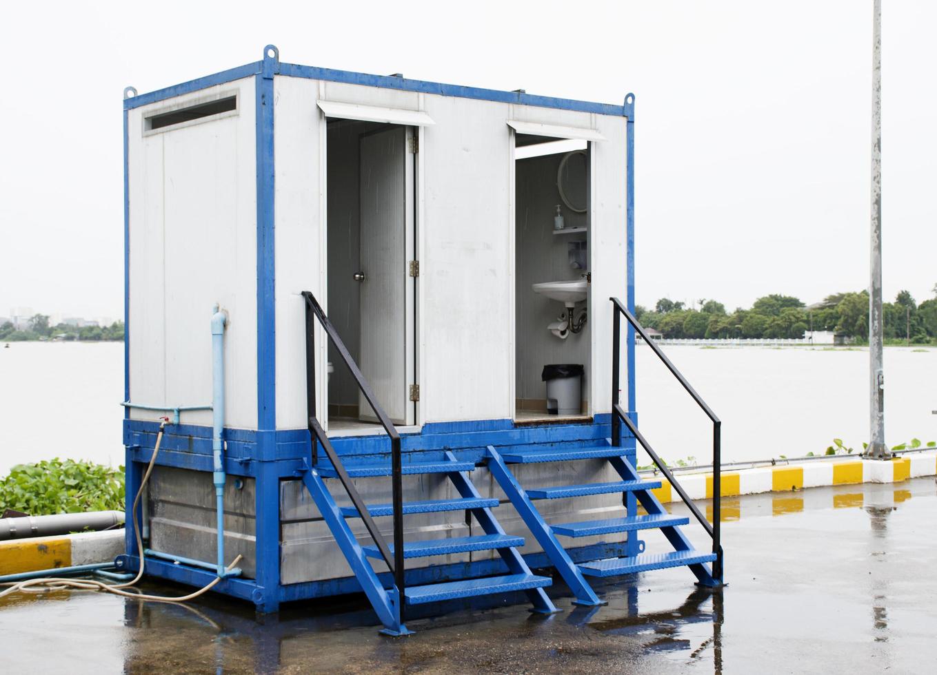 Temporary toilet in construction site photo