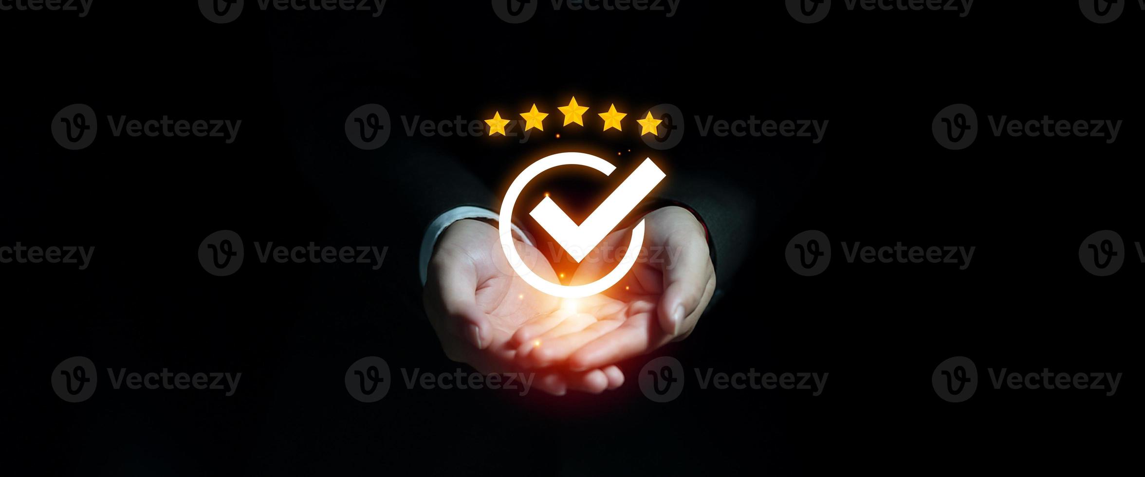Businessman showing virtual guarantee symbol banner, Standard quality control certification assurance guarantee concept. Hands giving the best quality of product and service to customer photo