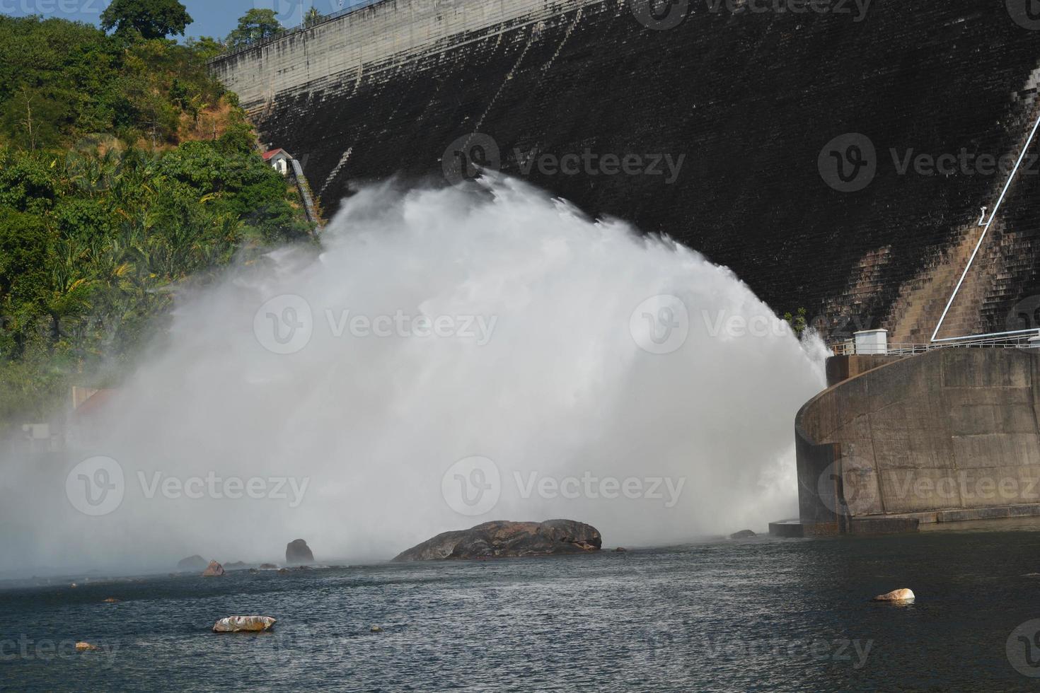 Khun Dan Prakarn Chon Dam drain more water from spillway. photo