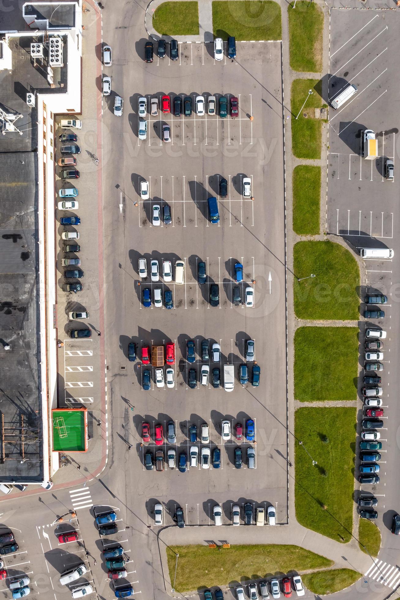 aerial view on large open air parking lot for cars for residents of