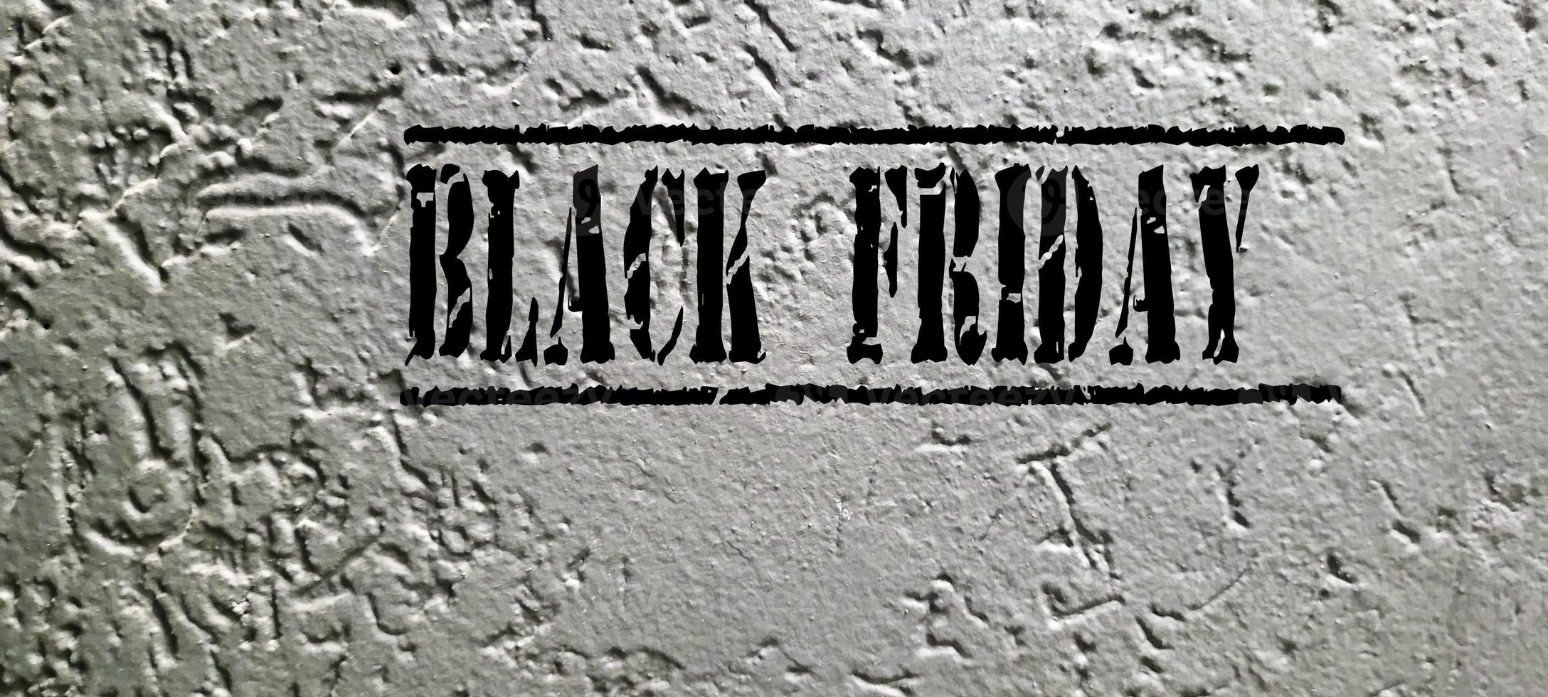 Black friday rustic wooden background, big black letters, sales promotion photo