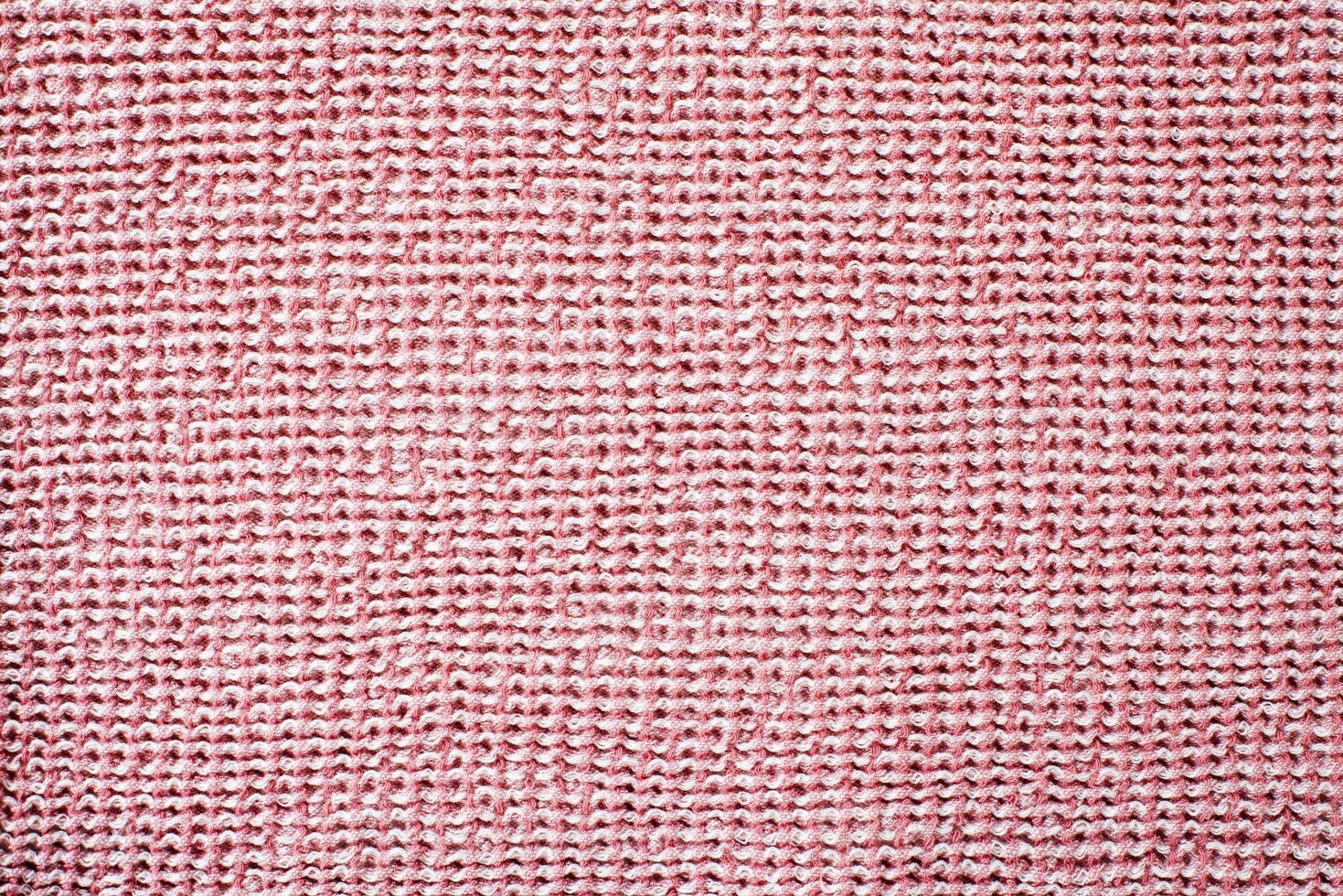 Smooth pink rough fabric texture top viev photo