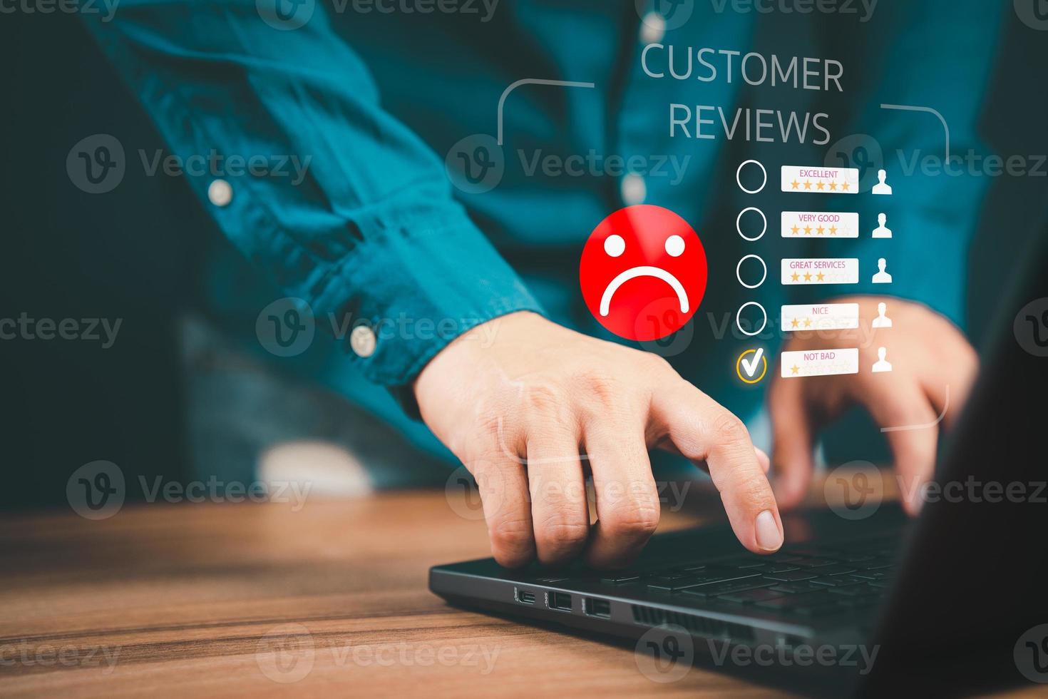 Unhappy man customer with sad emotion face on laptop. Bad review and service dislike poor quality, low rating, bad social media not good. Customer experience dissatisfied and testimonial concept. photo