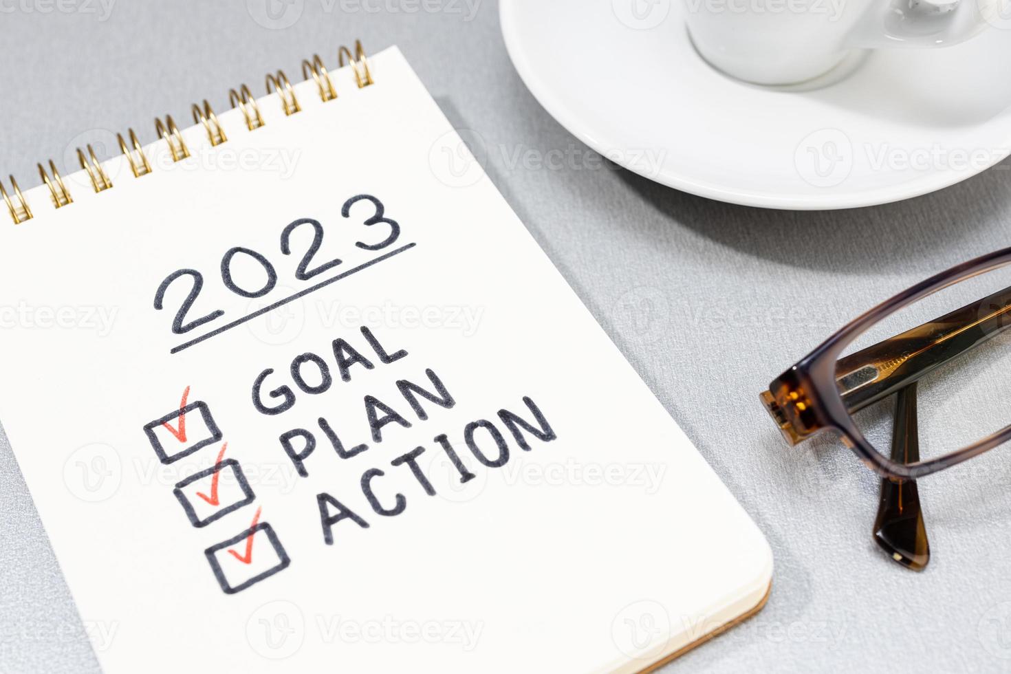 New year 2023 goal, plan, action checklist on notepad. Business ...