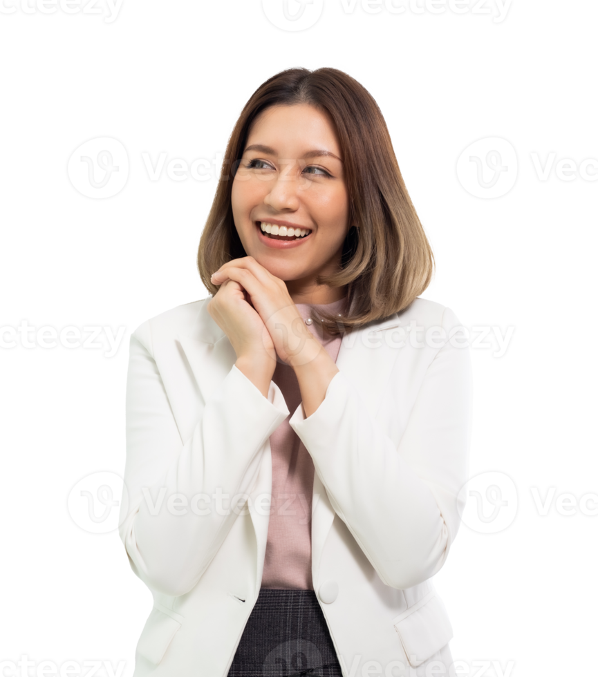 Asian woman holding hands on heart, looking pleased and happy, smiling