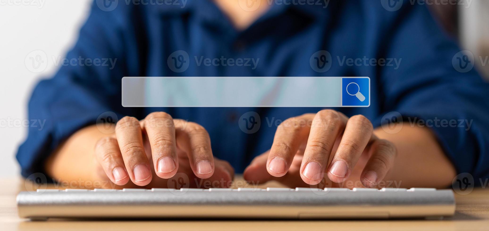 Businessman using a keyboard and notebook for searching information on the internet, searching browsing internet bar, Concept of Searching Browsing Internet Data Information Networking photo