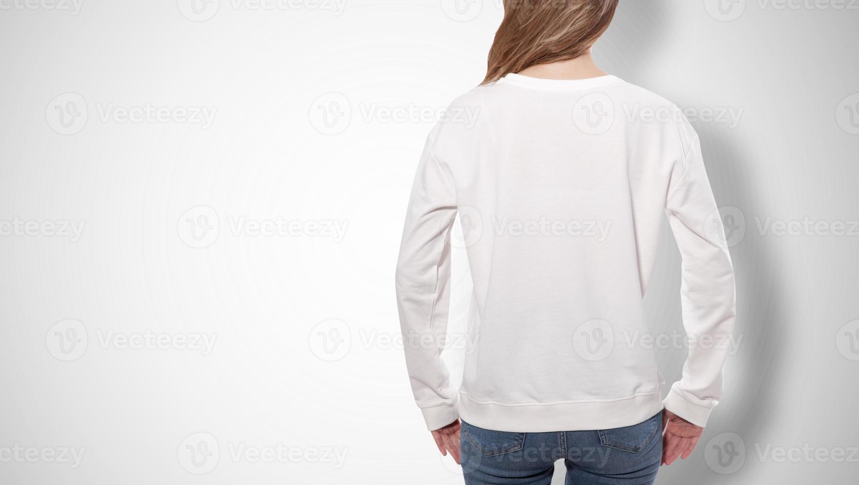 young woman in white sweatshirt, white hoodies. grey background photo