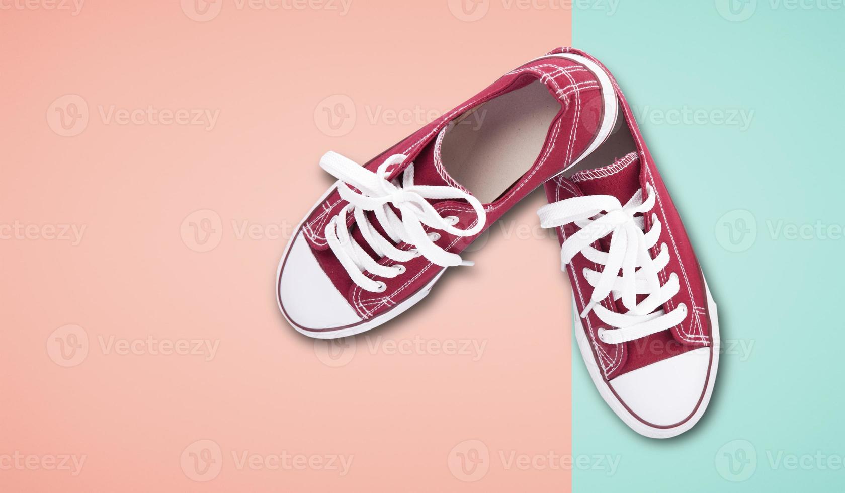 Red sneakers top view isolated on white background photo