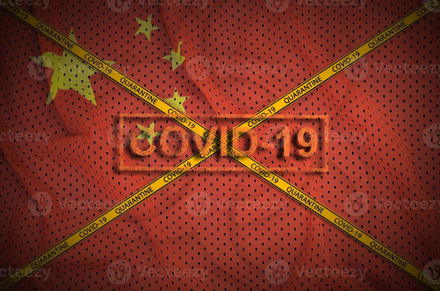 China flag and Covid-19 stamp with orange quarantine border tape cross. Coronavirus or 2019-nCov virus concept photo