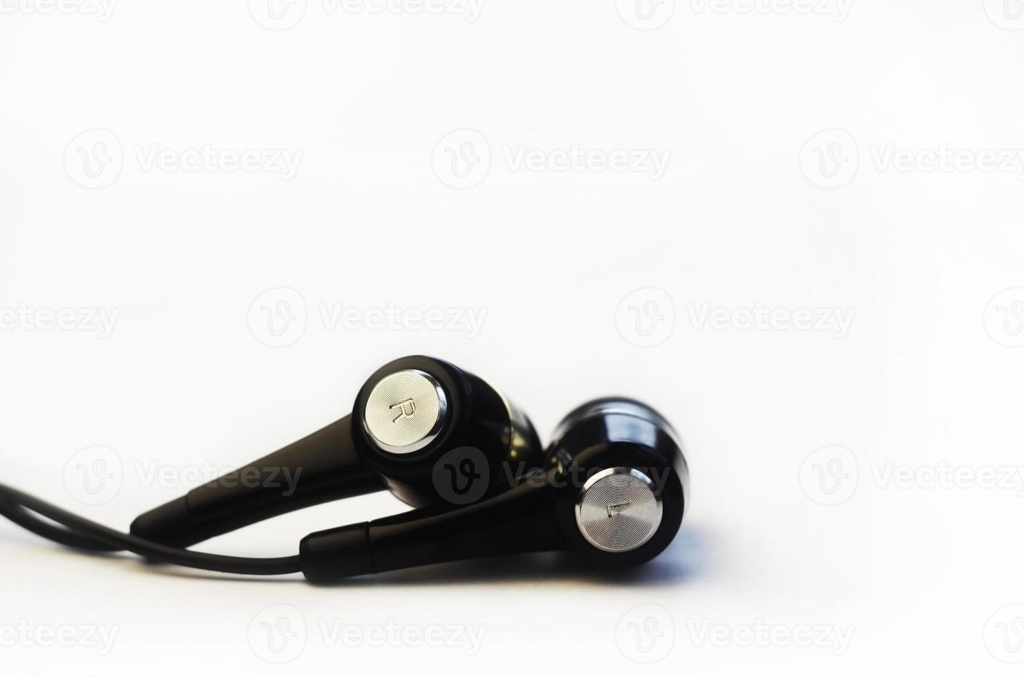 Earphones isolated on white photo