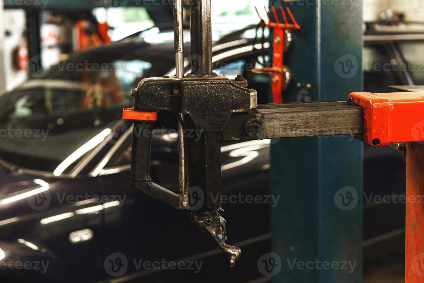 Pneumatic car tire mounting machine in the repair shop photo