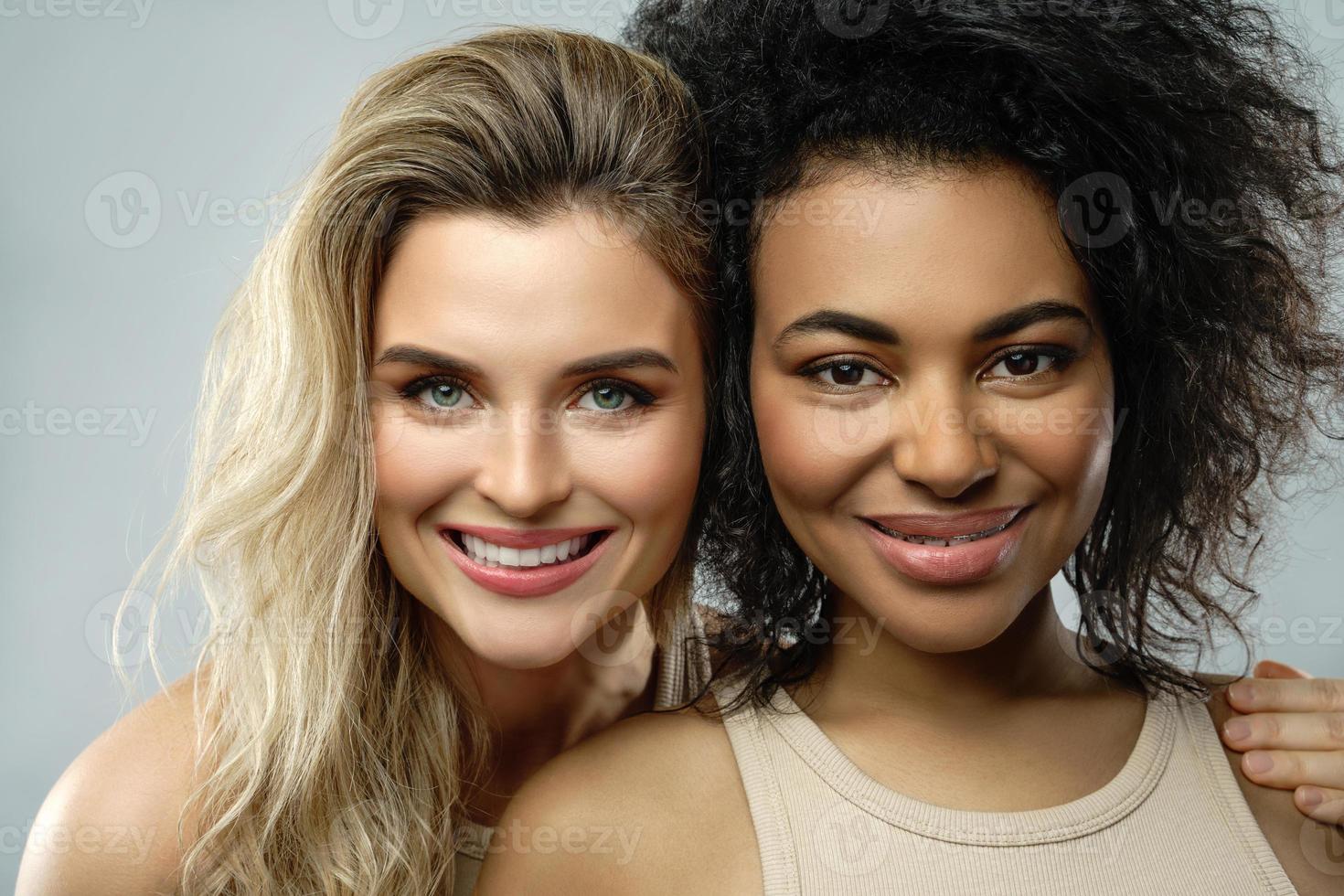 Portrait of Caucasian and African American women in studio photo