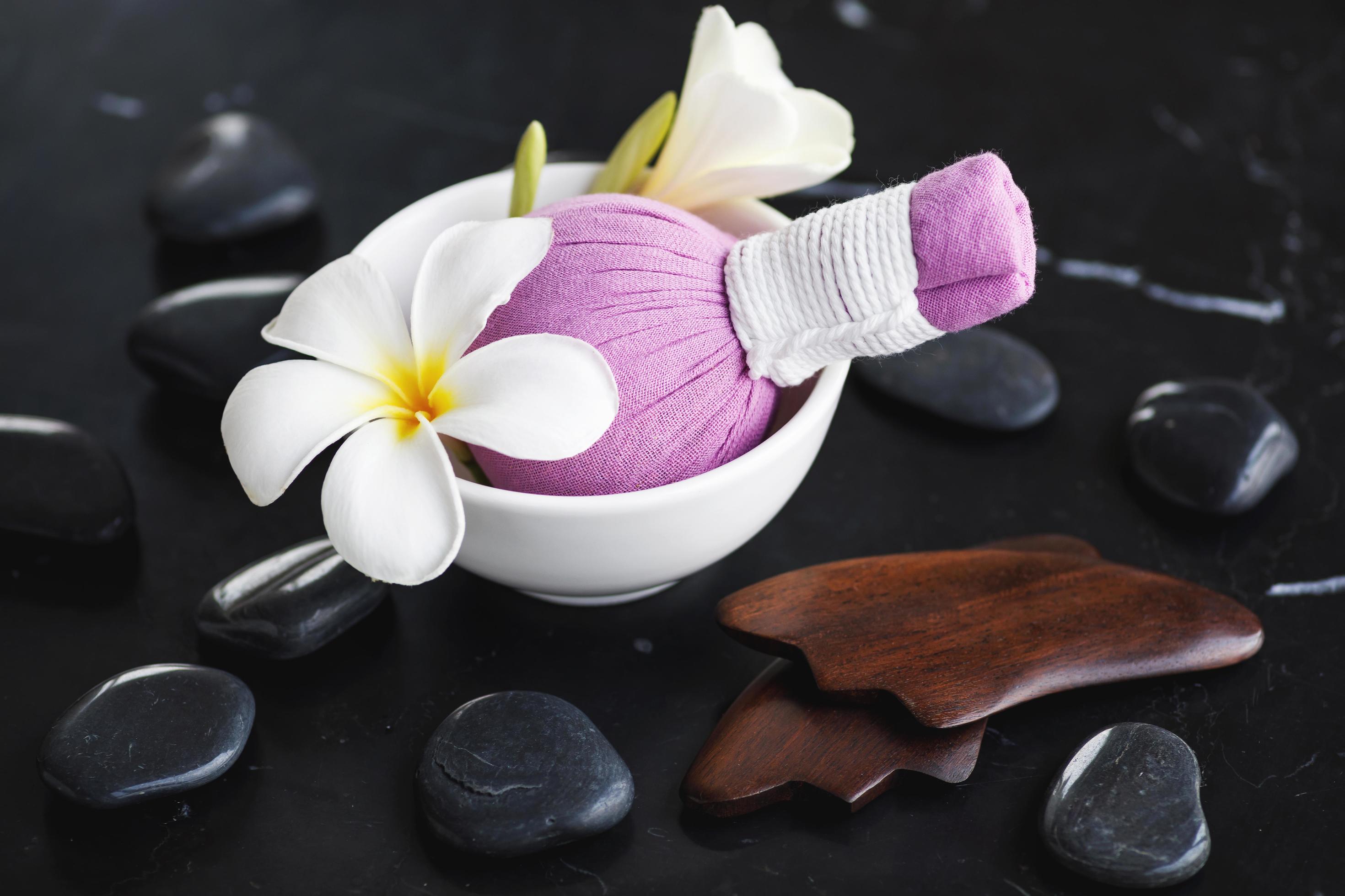 Tools for different kinds of asian massages 14353735 Stock Photo at