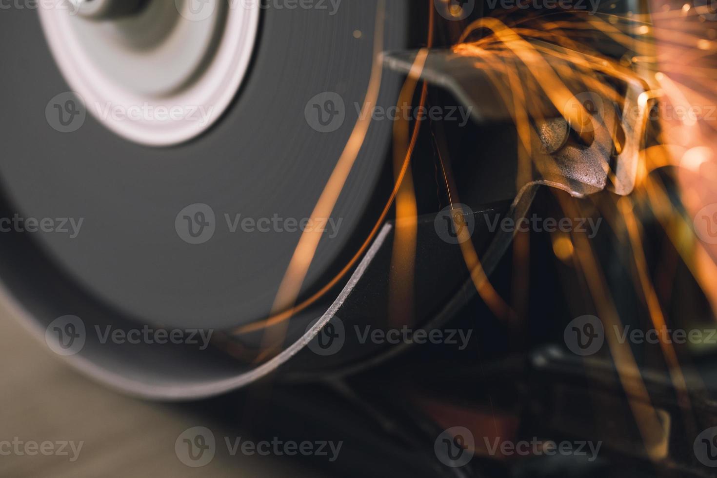 Close-up of bench grinder machine in workshop photo