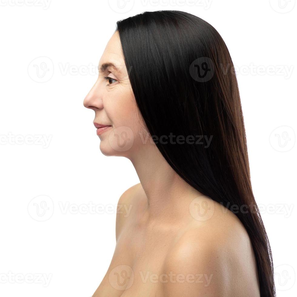 Beautiful middle aged woman on white background photo