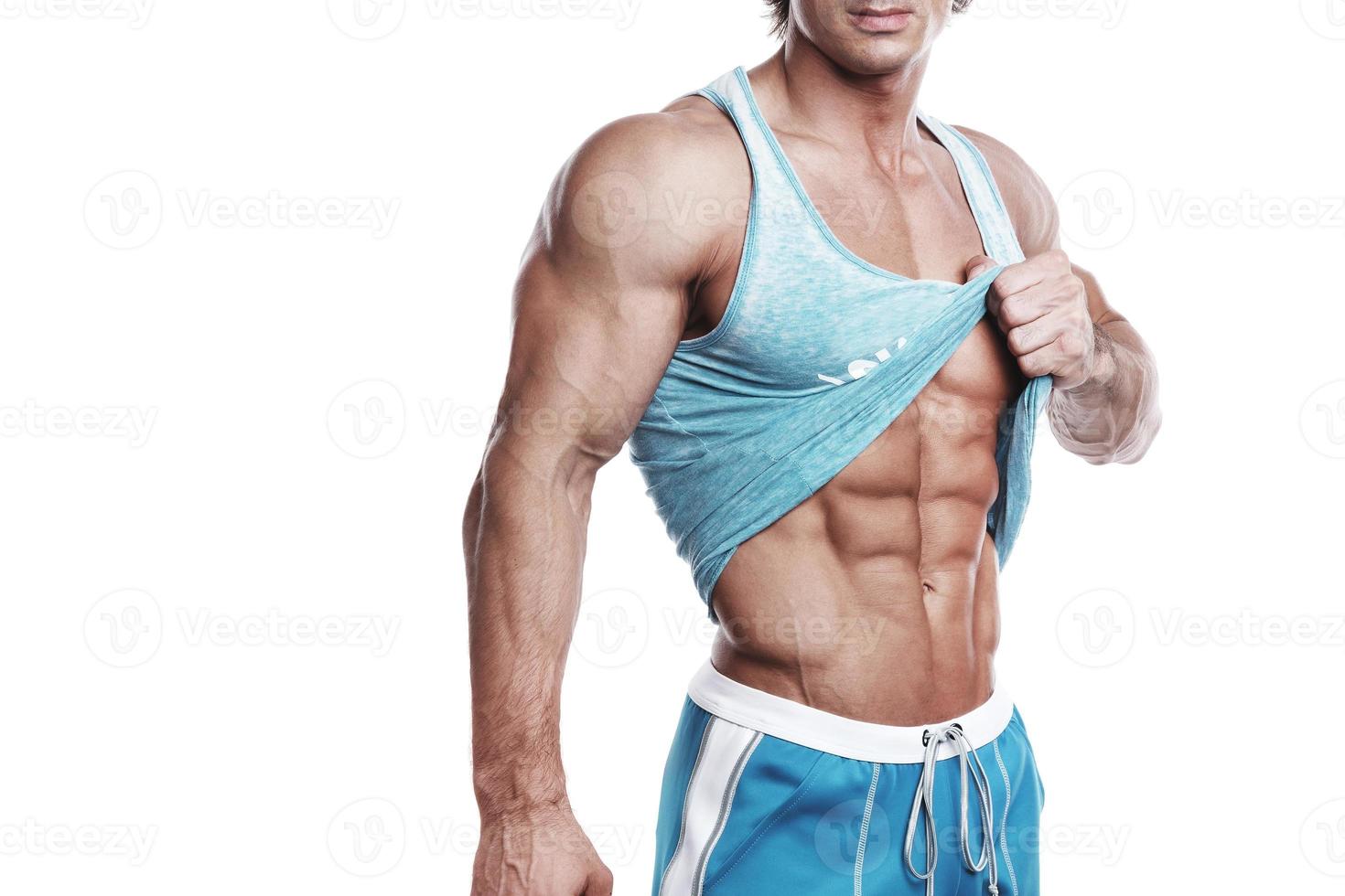 Shredded male torso with muscular chest and abs photo