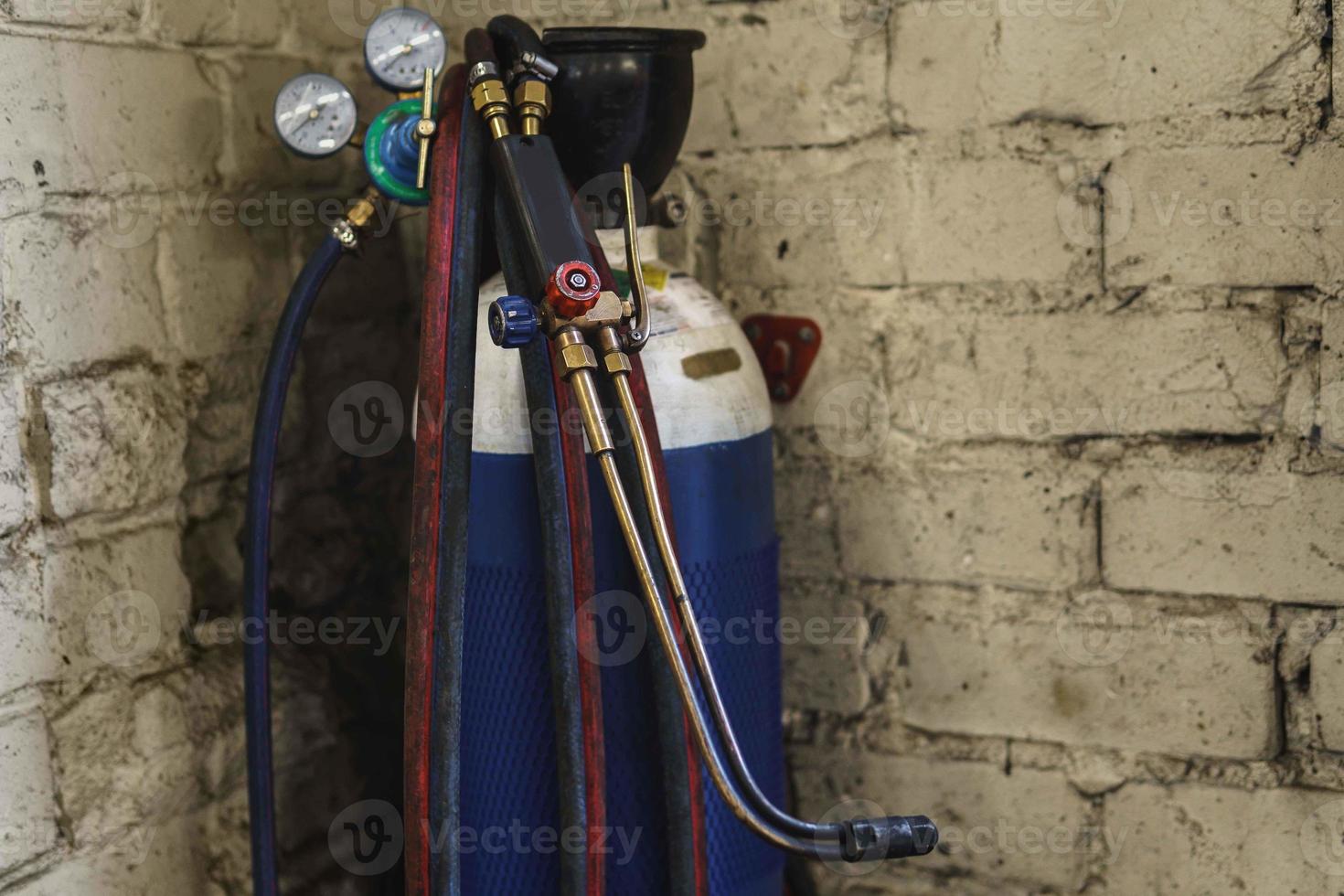 Oxy-fuel welding and cutting station in workshop photo