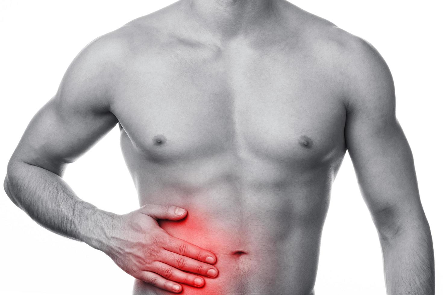 Man with pain in his stomach photo