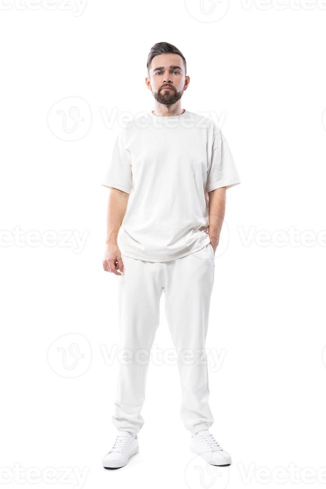 Handsome man wearing white clothes with a blank space for design on white background photo