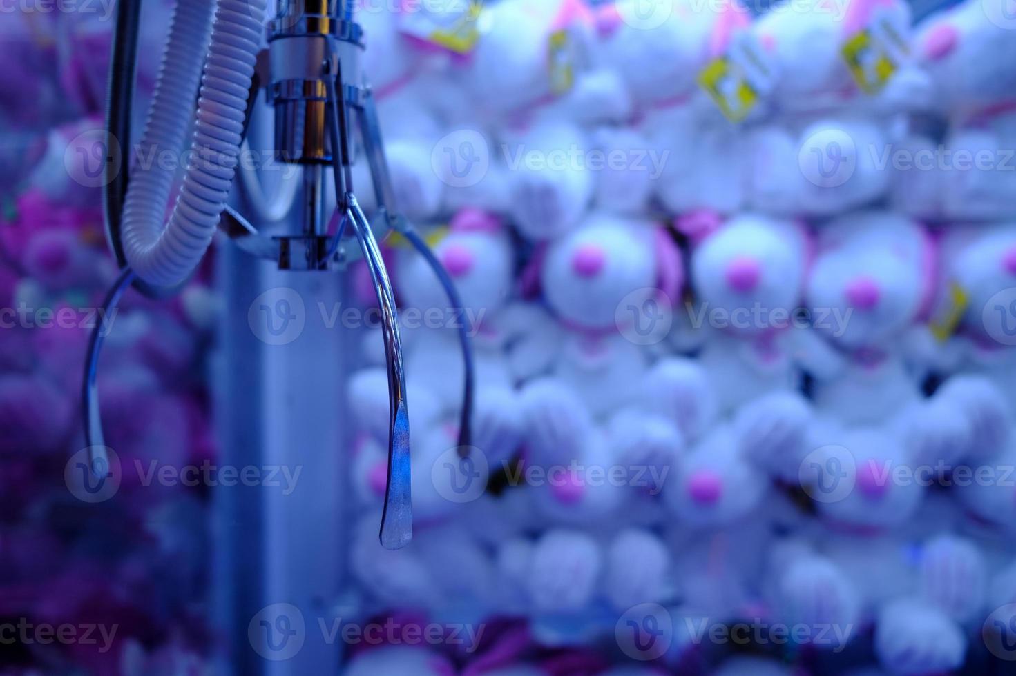 Toy Crane Claw Machine in Selective Focus. photo