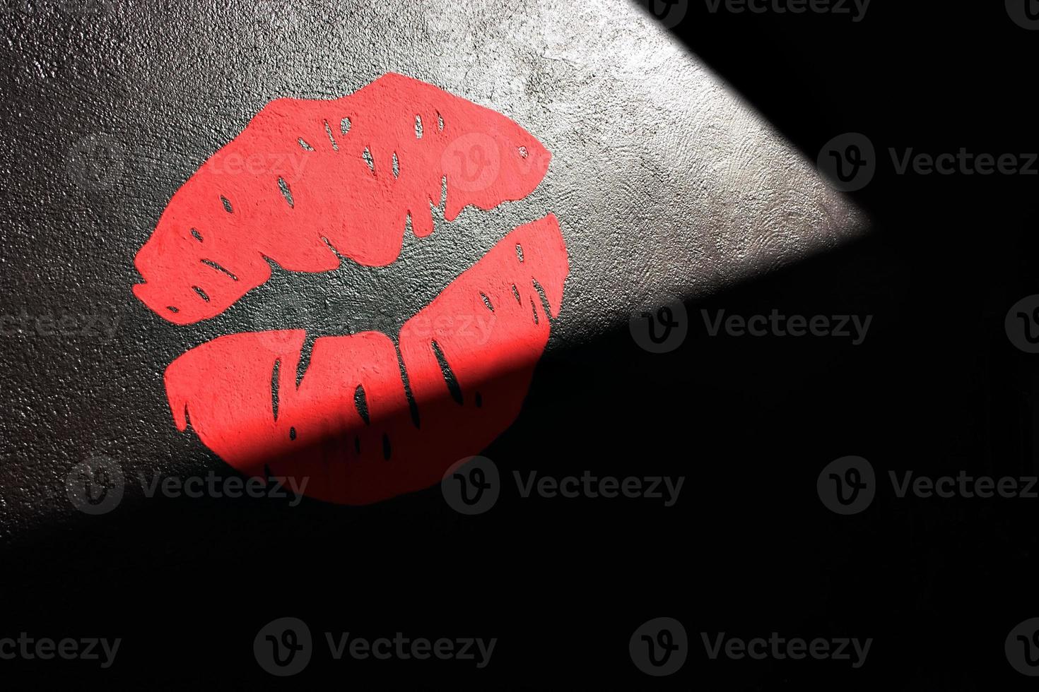 Red lips painted on the wall. Horizontal image. photo