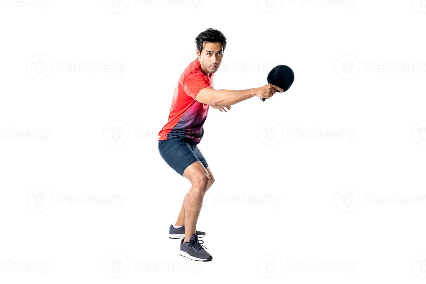 Portrait of sports man male athlete playing table tennis isolated. photo