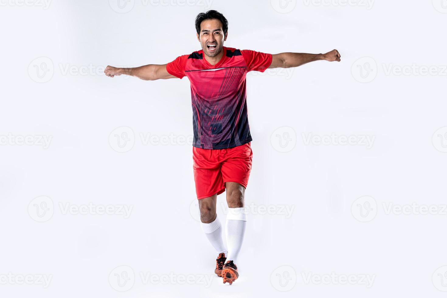 Young footballer Show excitement and joy after winning and celebrating success. photo