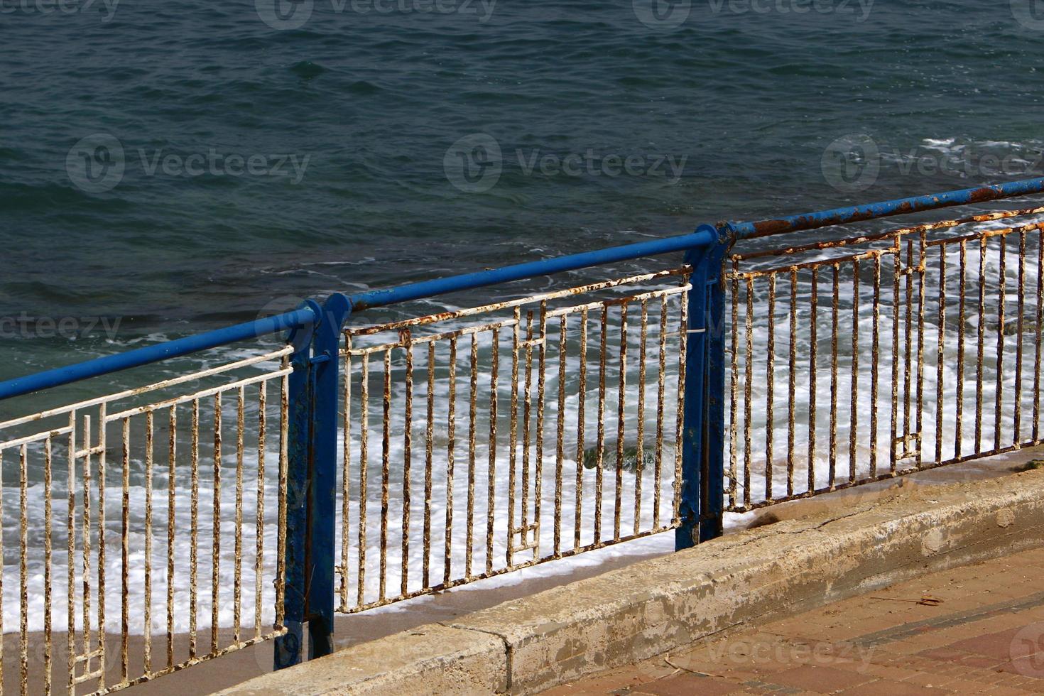 Security fence on the Mediterranean coast. photo