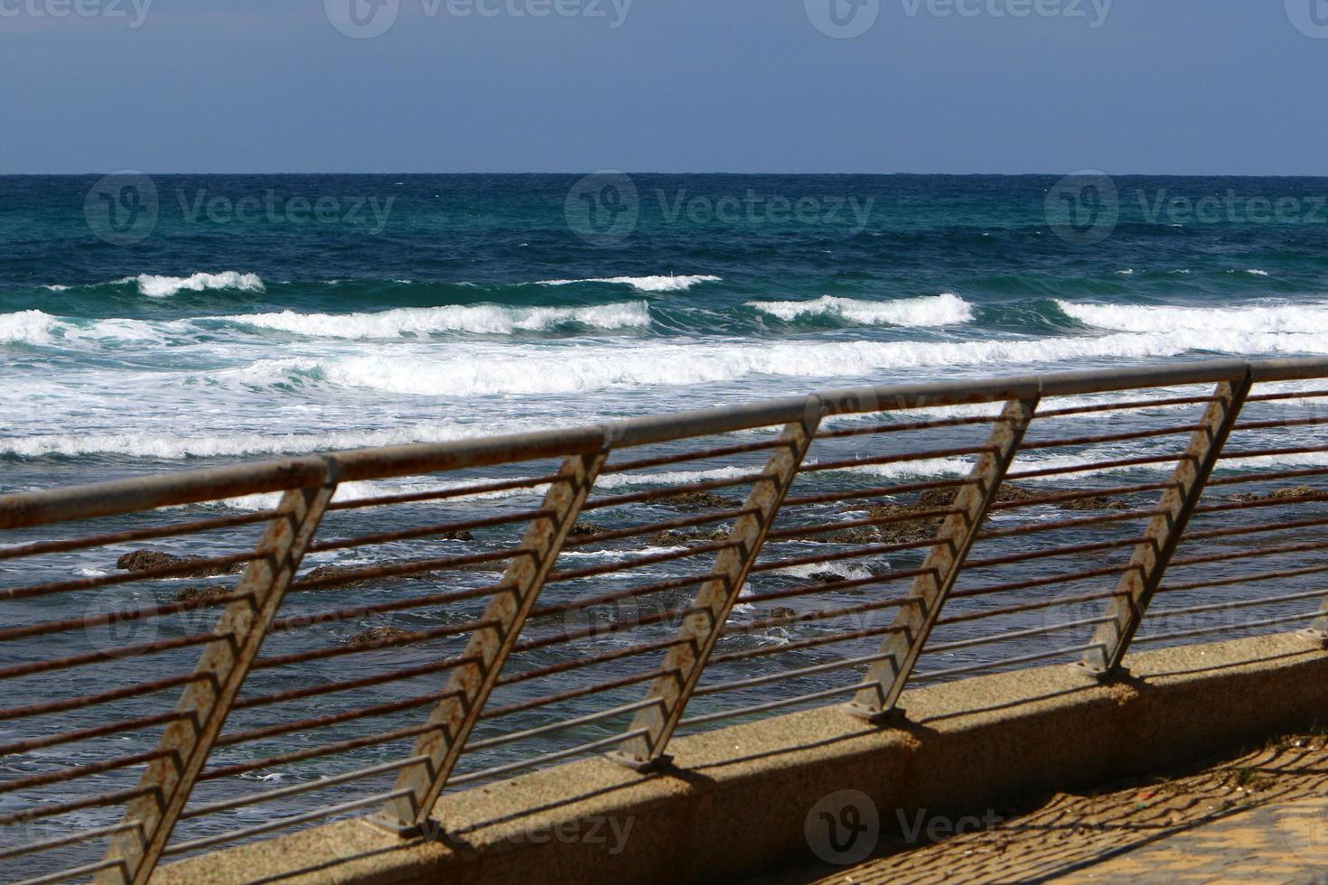 Security fence on the Mediterranean coast. photo