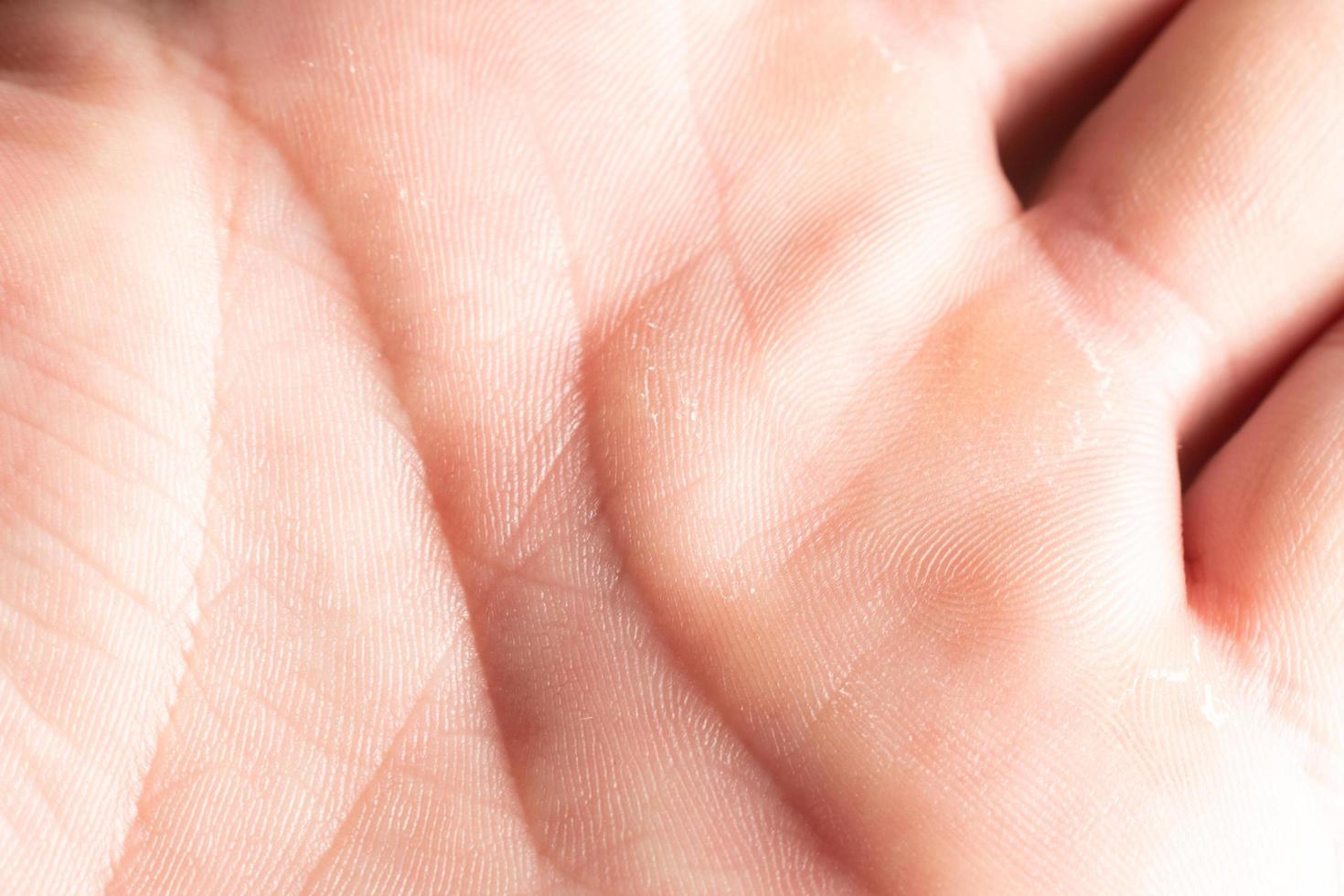 Human palm and life lines close-up, science of palmistry. photo