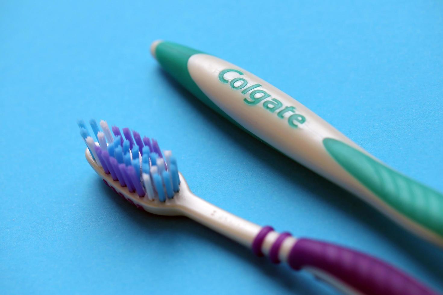 TERNOPIL, UKRAINE - JUNE 23, 2022 Colgate toothbrushes, a brand of oral hygiene products manufactured by American consumer-goods company Colgate-Palmolive photo