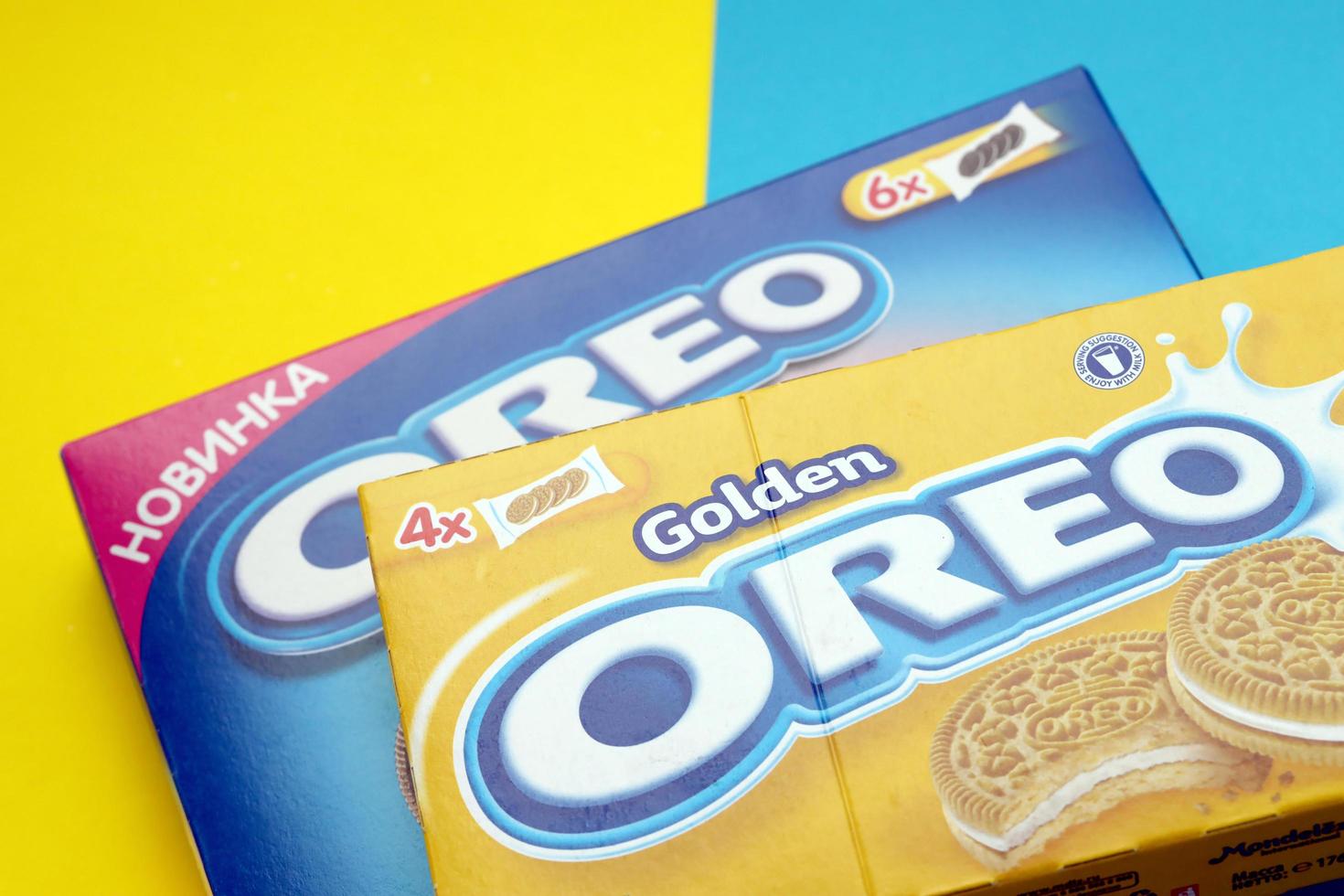 TERNOPIL, UKRAINE - MAY 28, 2022 Oreo golden and strawberry cheesecake crispy cookie box. The brand Oreo is owned by company Mondelez international photo