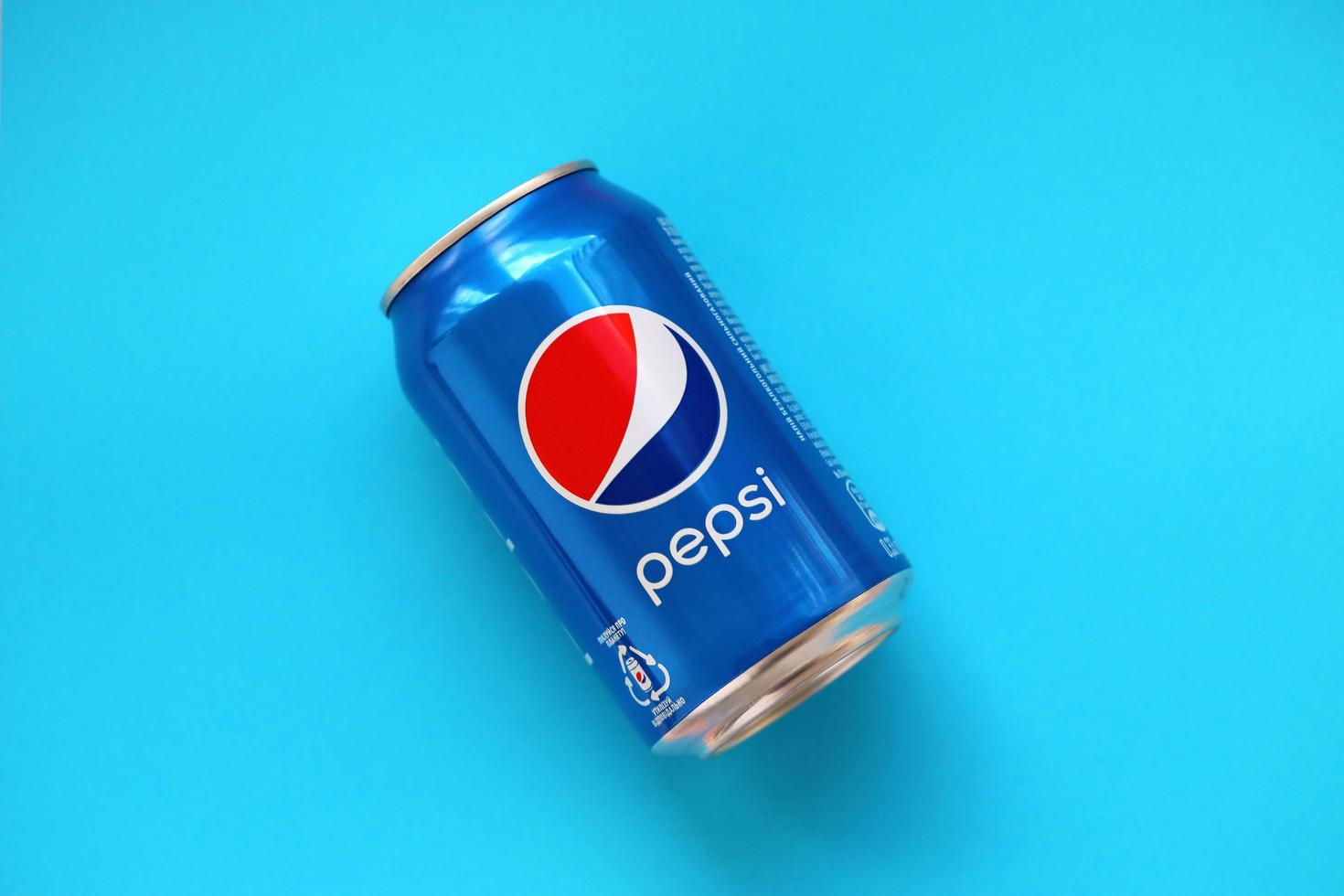 TERNOPIL, UKRAINE - MAY 28, 2022 Cold Pepsi drink can. Pepsi is a carbonated soft drink produced by PepsiCo photo