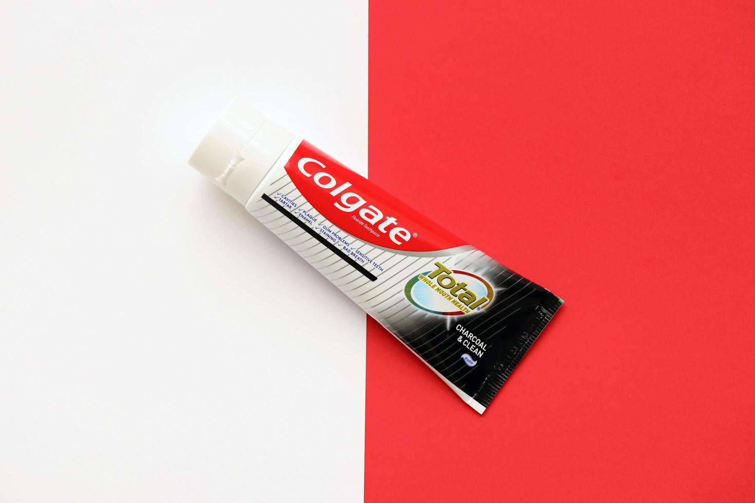 TERNOPIL, UKRAINE - JUNE 23, 2022 Colgate toothpaste, a brand of oral hygiene products manufactured by American consumer-goods company Colgate-Palmolive photo