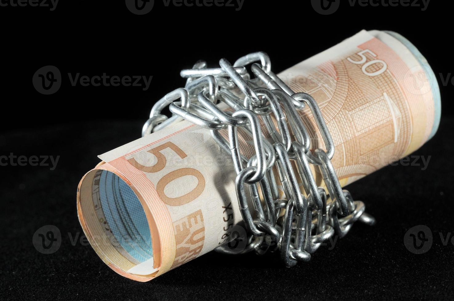 Money in chains photo