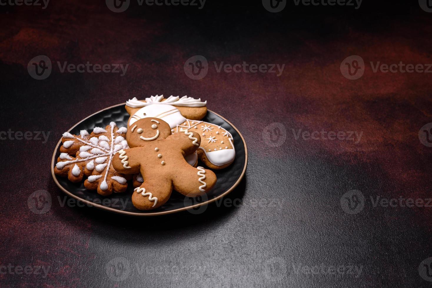 Home festive Christmas table decorated by toys and gingerbreads photo