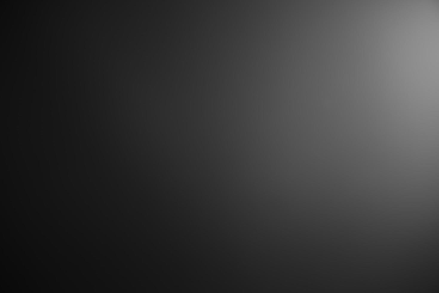 Dark black and gray blurred gradient background has a little abstract light. soft background for wallpaper,design,graphic and presentation, backdrop wall photo