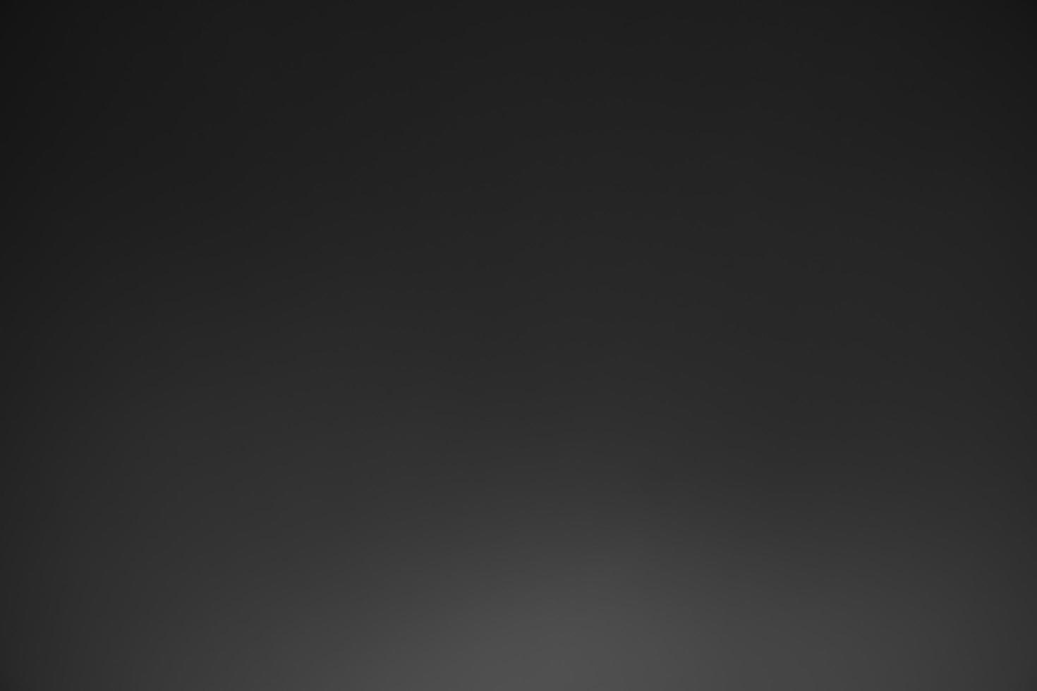 Dark black and gray blurred gradient background has a little abstract light. soft background for wallpaper,design,graphic and presentation, backdrop wall photo