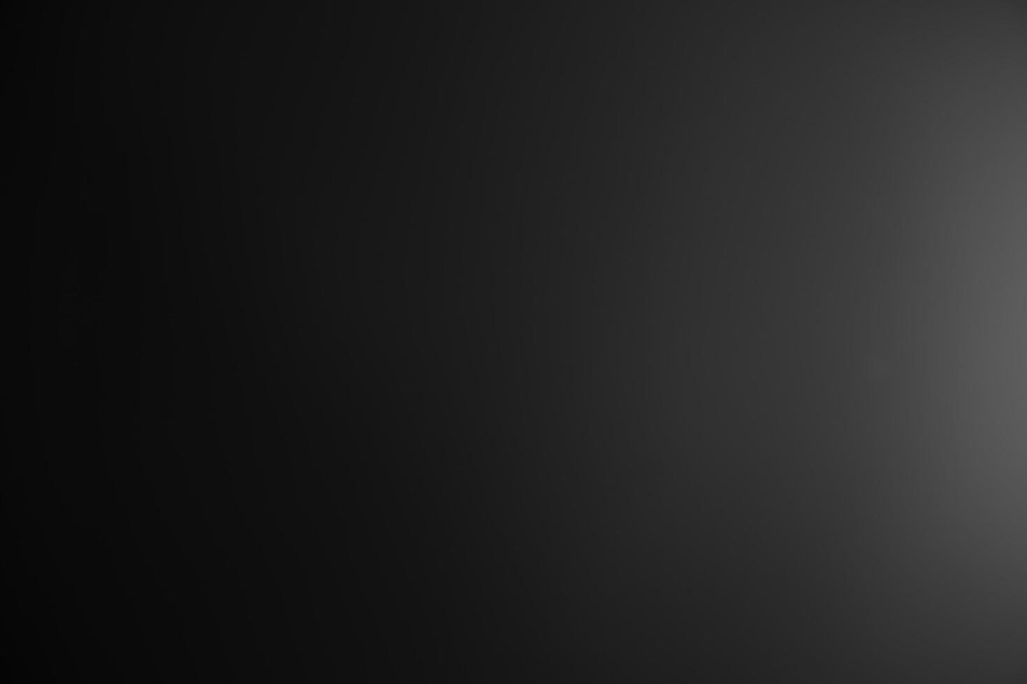 Dark black and gray blurred gradient background has a little abstract light. soft background for wallpaper,design,graphic and presentation, backdrop wall photo