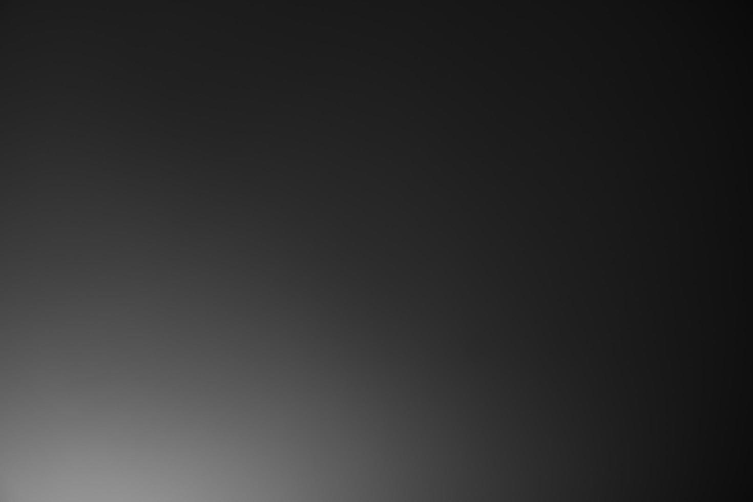 Dark black and gray blurred gradient background has a little abstract light. soft background for wallpaper,design,graphic and presentation, backdrop wall photo